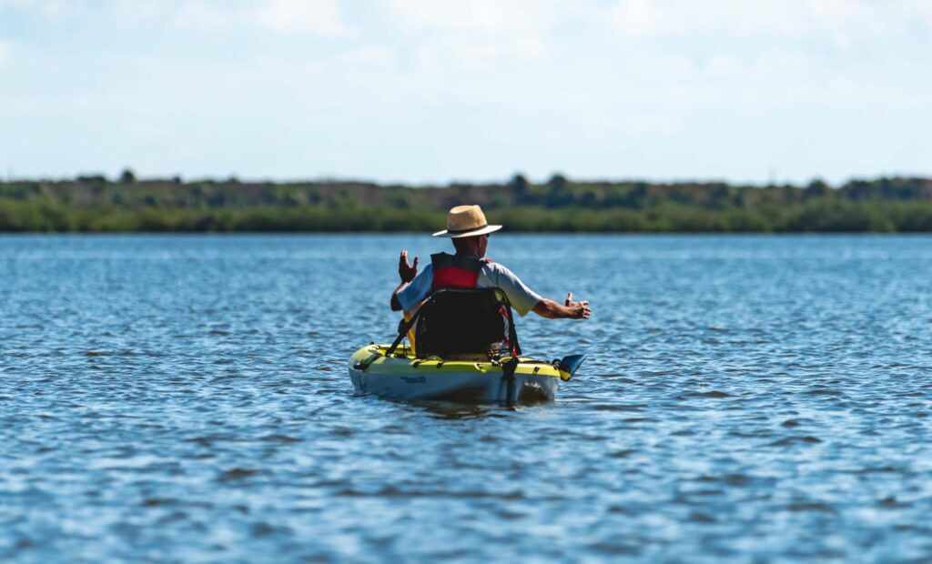 Guest moves handsfree on guided sunrise & morning pedal kayak tours through Canaveral National Seashore. This was from the Apollo Beach Visitor center and is a way to kayak New Smyrna Beach.